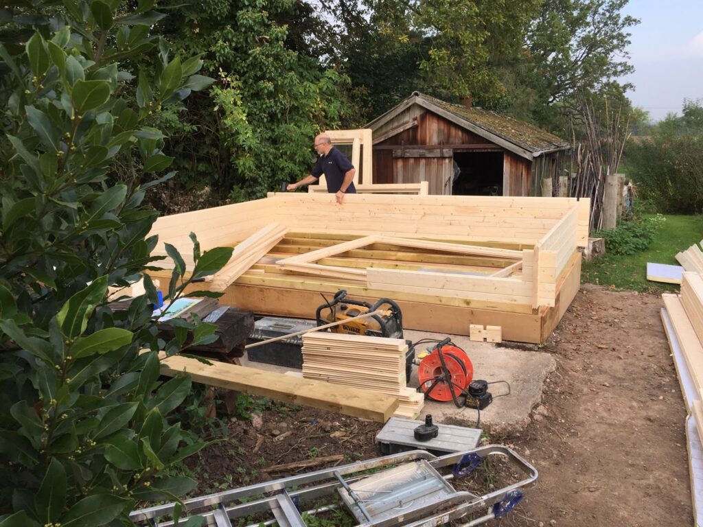 Dorset log cabin assembly process